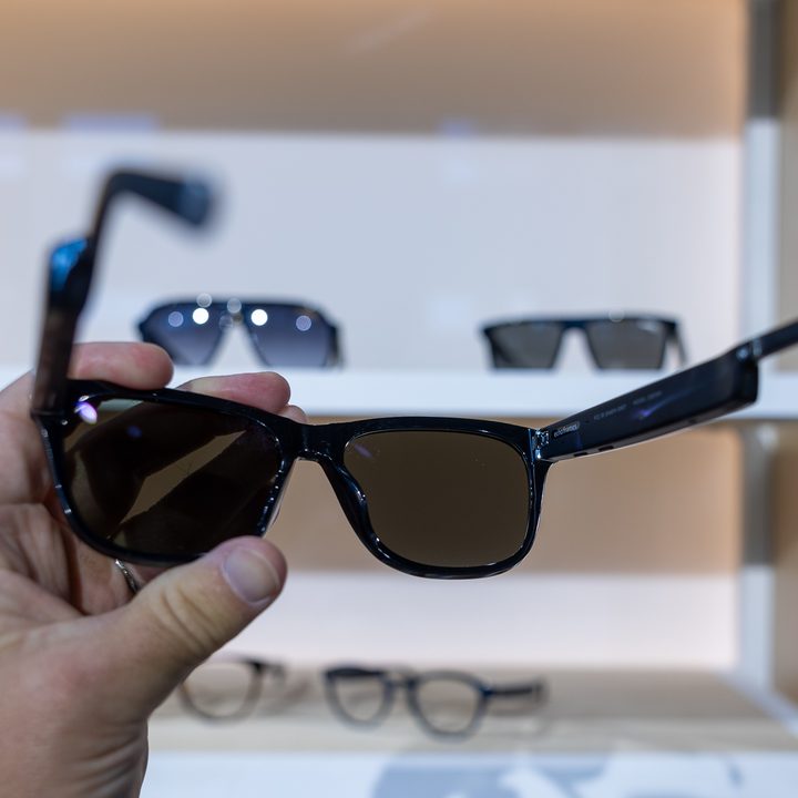 A pair of the sunglasses version of the Amazon Echo Frames on display at the 2023 Amazon fall devices event.