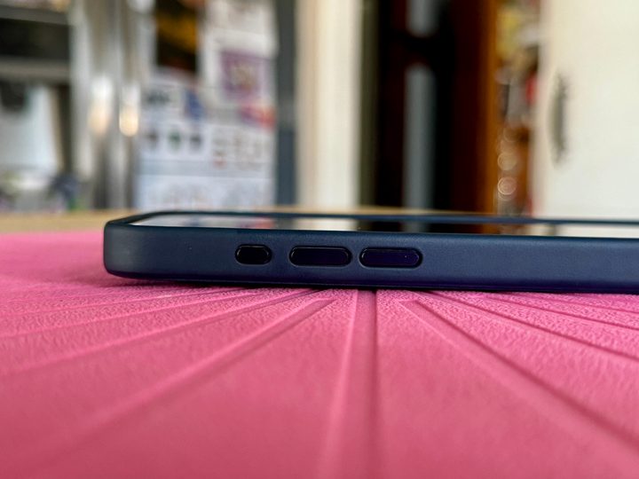 Action and volume buttons on the Apple FineWoven case for iPhone 15 Pro.