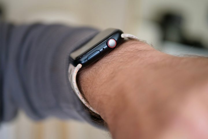 The Apple Watch Series 9 seen from the side on a person's wrist.