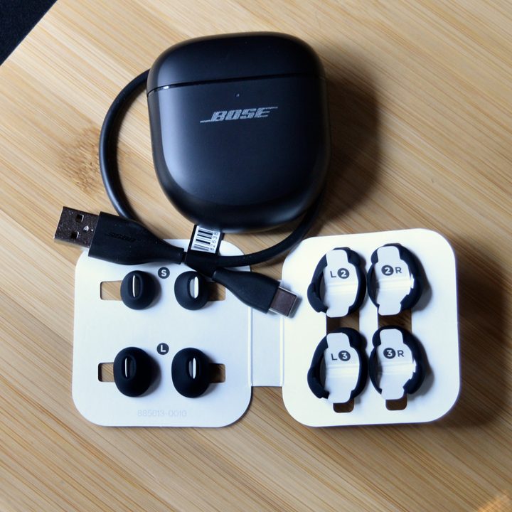 Bose QuietComfort Ultra Earbuds with accessories.
