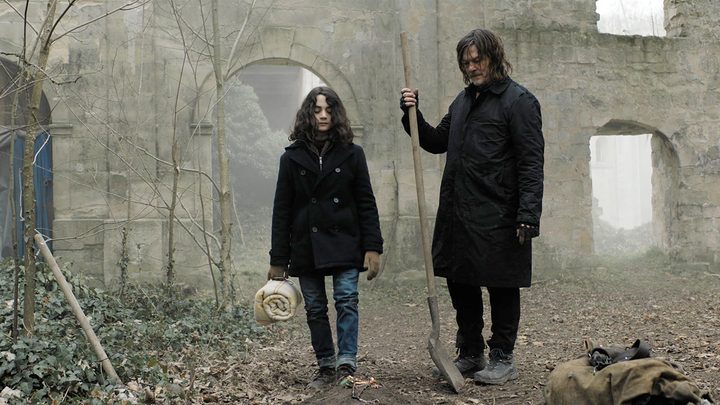 Daryl walking with Laurent in a scene from The Walking Dead: Daryl Dixon.