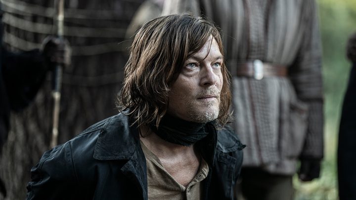 Daryl on his knees looking angry in a scene from The Walking Dead: Daryl Dixon.