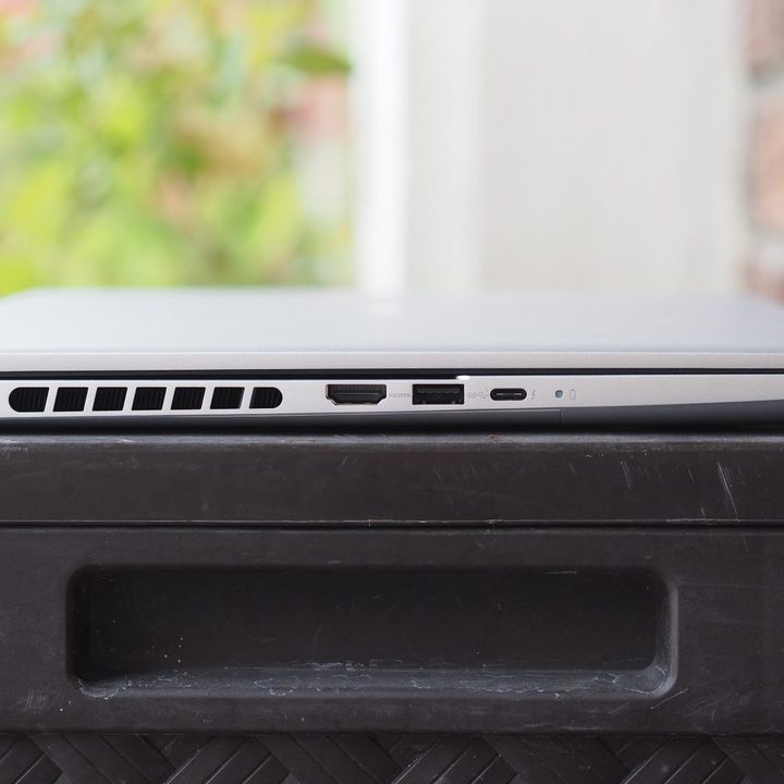 Dell Inspiron 16 Plus left side view showing ports and vents.