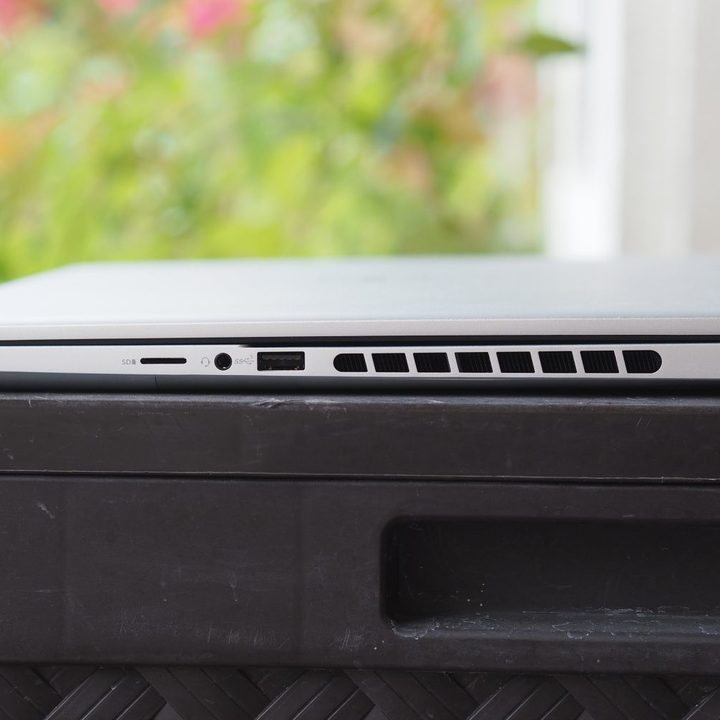 Dell Inspiron 16 Plus right side view showing ports and vents.