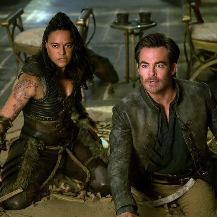A female and male character duck for cover in a scene from Dungeons & Dragons: Honor Among Thieves