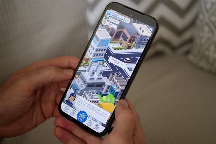 A person playing a game on the Fairphone 5.