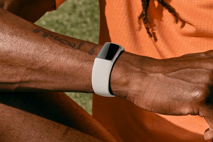 Checking the Fitbit Charge 6.