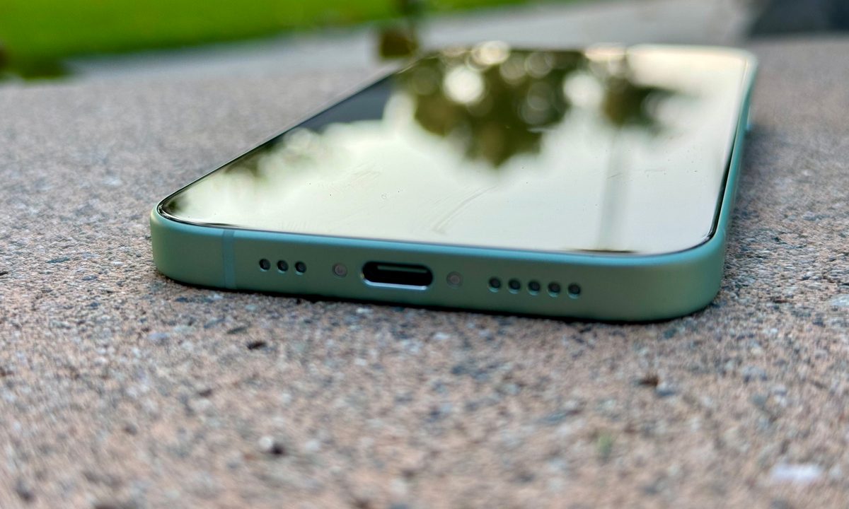 A view of the USB-C port on the green iPhone 15.