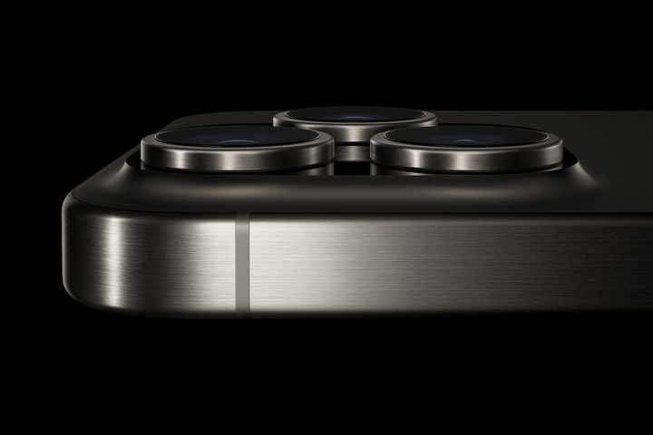 Apple promotional image of the iPhone 15 Pro's camera and curved chassis.