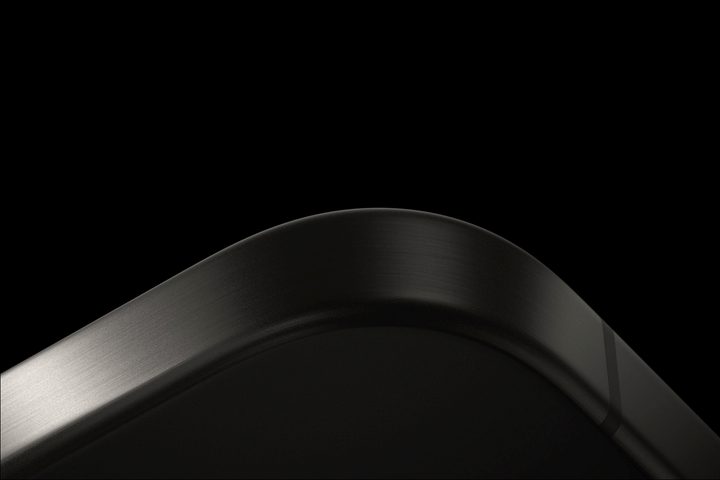 Apple promotional image of the iPhone 15 Pro's curvier sides.