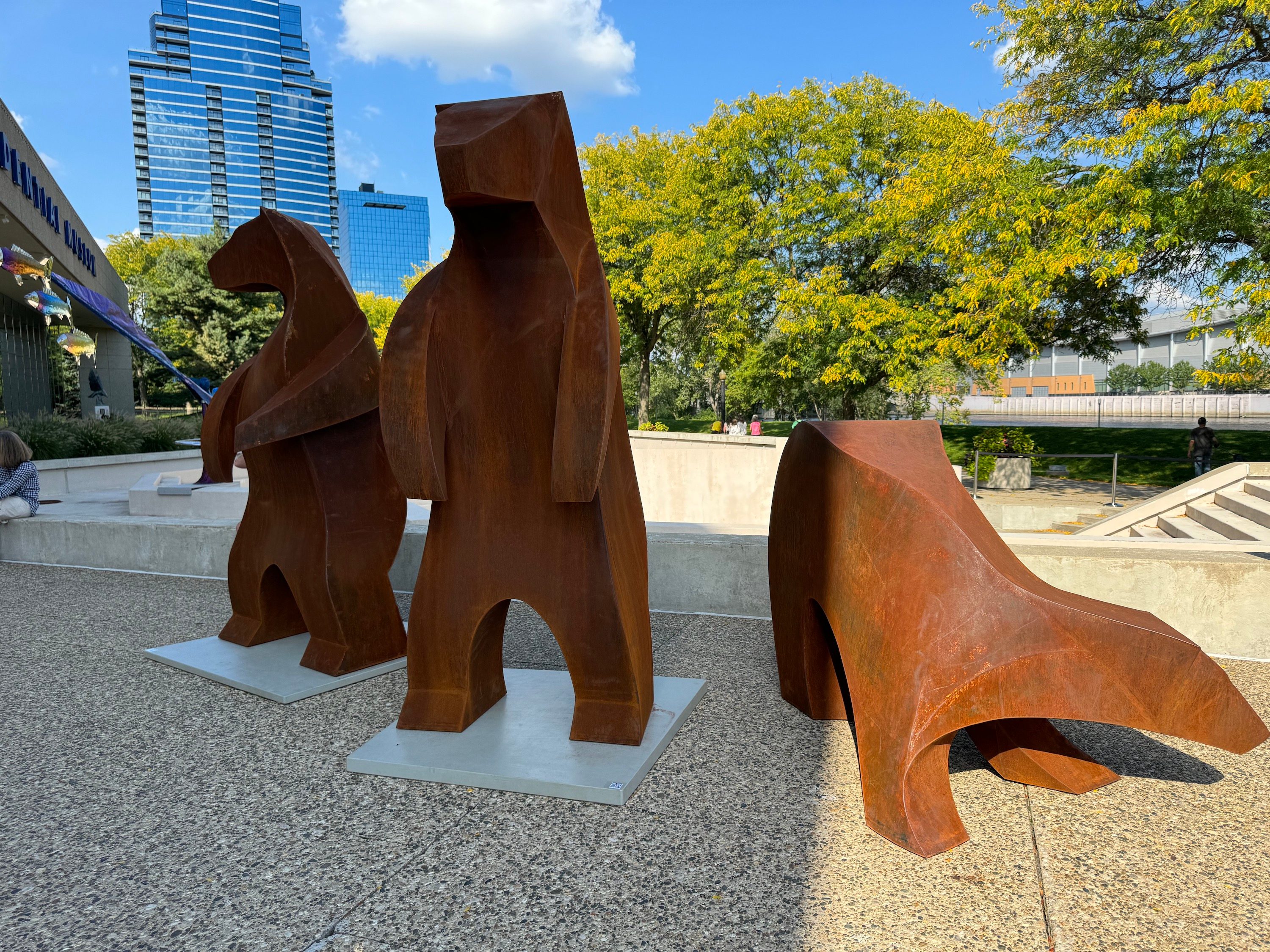 Photo from the iPhone 15 Pro Max main camera of three wooden bears.