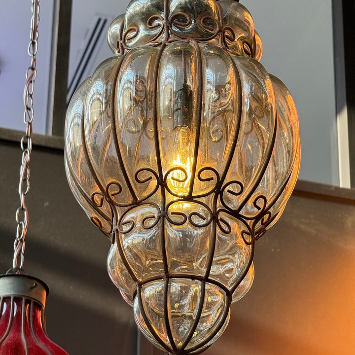 Photo from the iPhone 15 Pro Max telephoto camera of lights in a restaurant.