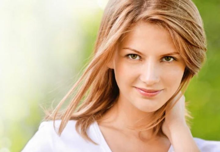 A woman wearing contact lenses.