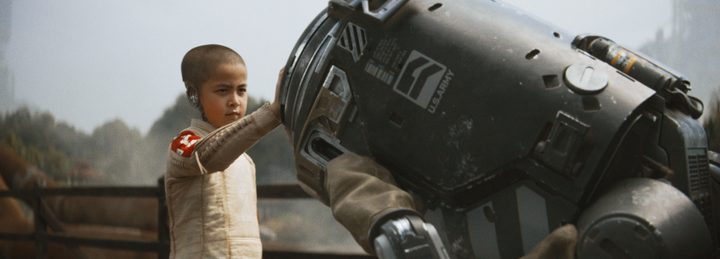 Madeline Voyles as Alphie touches a bomber drone in The Creator.