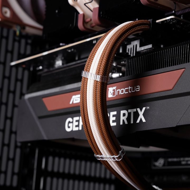 GPU installed in a custom, Noctua-themed gaming PC.
