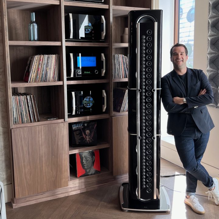 David Mascioni, Global Director of Brand Marketing at McIntosh Group standing next to a McIntosh speaker.