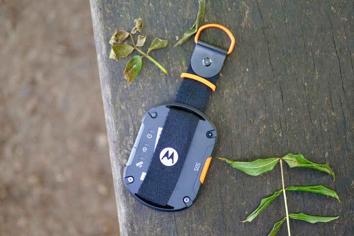 The Motorola Defy on a bench.