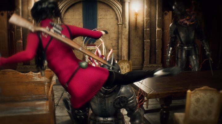 Ada Wong spin kicks a knight in Resident Evil 4: Separate Ways.
