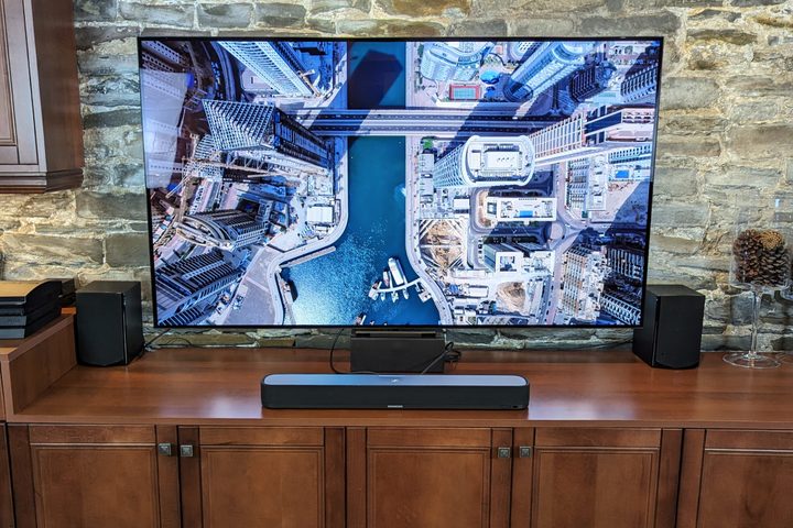 Sennheiser Ambeo Soundbar Mini in front of a 65-inch TV.