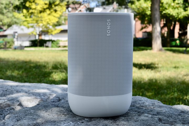 Sonos Move 2 in white on rock in park.