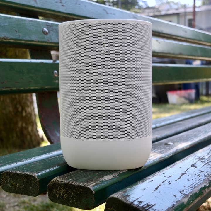 Sonos Move 2 in white on green park bench.