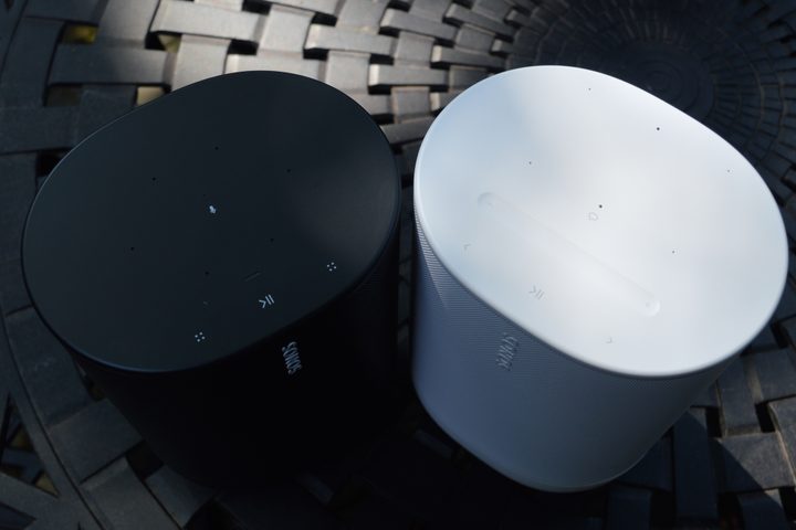 Sonos Move in black and Move 2 in white, top view.