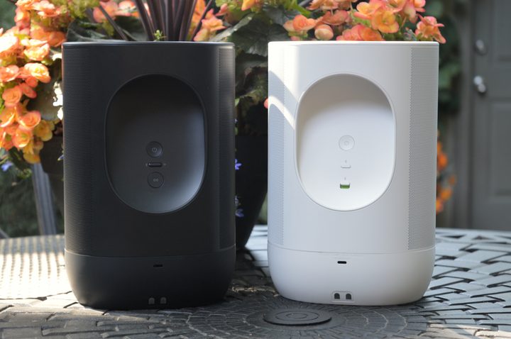 Sonos Move in black and Move 2 in white, seen from behind.