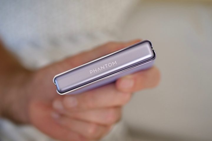 The Tecno Phantom V Flip's logo on the closed hinge.