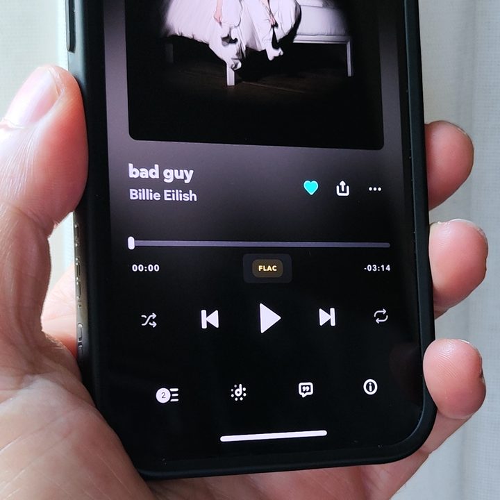 Tidal's beta app for iOS showing a track in FLAC format.