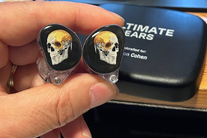Ultimate Ears Premier wired IEMs seen with optional faceplates installed.