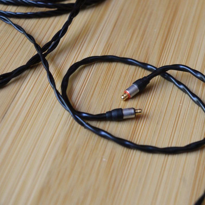 Ultimate Ears Premier wired IEMs, close-up on the audio cable's IPX connectors.