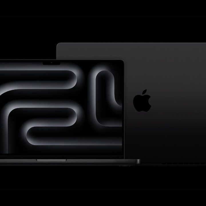 Two MacBooks Pro renders side by side against a black backround.