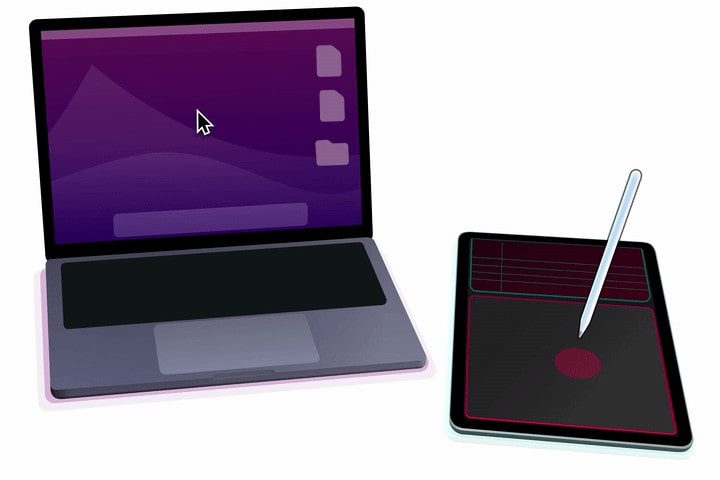 A MacBook next to an iPad with an Apple Pencil. The Astropad Slate app is being used, which lets the Apple Pencil control the Mac's mouse pointer.