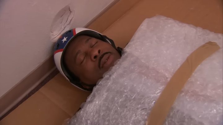Stanley wearing a helmet in "The Office."