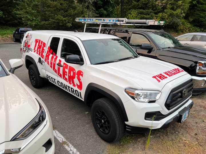 A pest control truck owned by "The Killers" sits parked at Skamania Lodge.