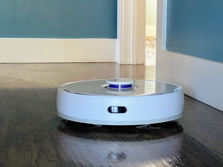 A Narwal mops hardwood floors.