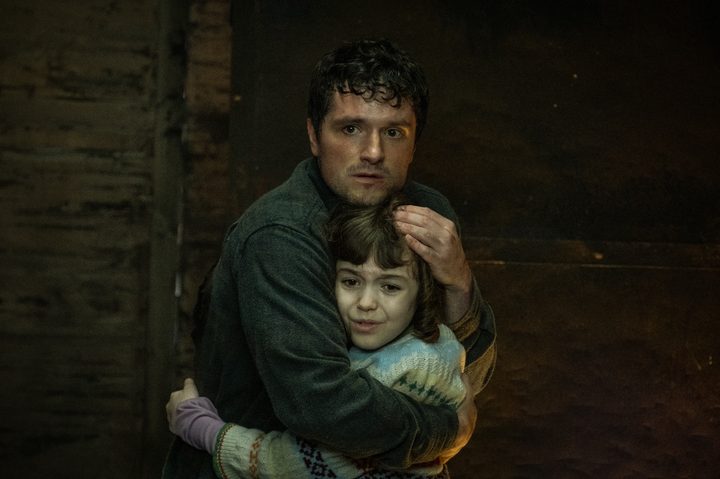 Josh Hutcherson hugs Piper Rubio in Five Nights at Freddy's.