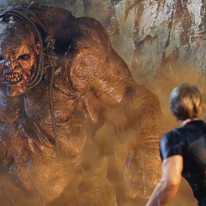 Leon facing El Gigante in Resident Evil 4 Remake.
