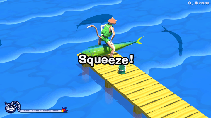 A cat catches a fish with its thighs in WarioWare: Move It!