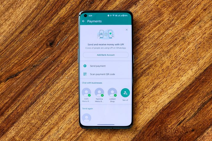 WhatsApp Pay payments option on Android phone kept on a table.