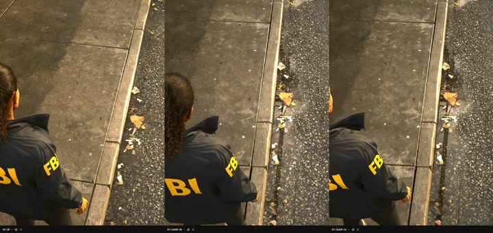A sidewalk puddle showing reflections in Alan Wake 2.