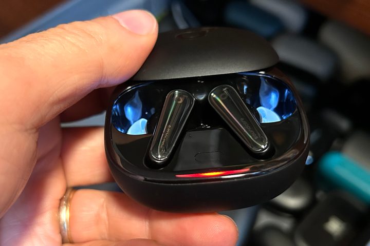 Anker Soundcore Liberty 4 charging case showing red LED for low battery.