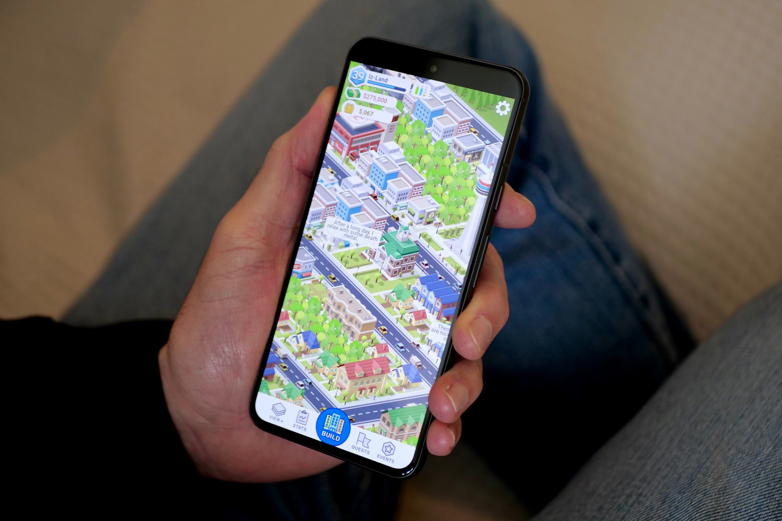 A person playing a game on the Google Pixel 8.