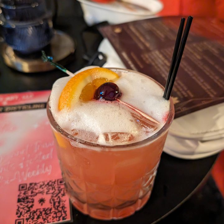 A photo of a pink mixed drink, taken with the Google Pixel 8 Pro.