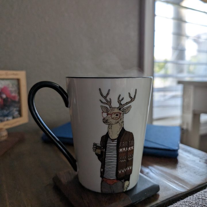 Photo of a cup of tea with steam coming off the top, taken with the Google Pixel 8 Pro.