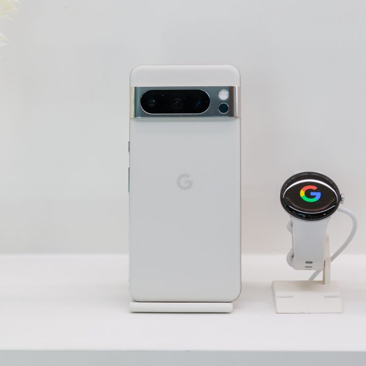 Google Pixel 8 Pro in white with a matching Pixel Watch 2.
