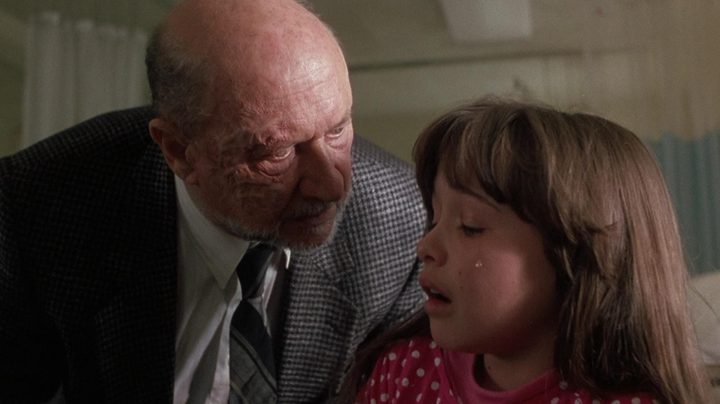 Dr. Loomis looms over Jamie Lloyd in Halloween 5: The Revenge of Michael Myers