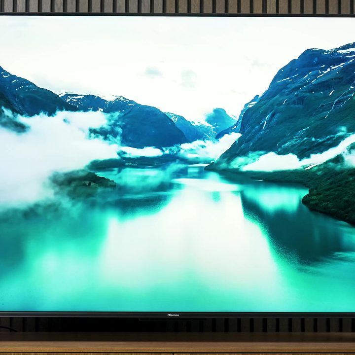 A fjord with glacially green waters shown on a Hisense U7K.