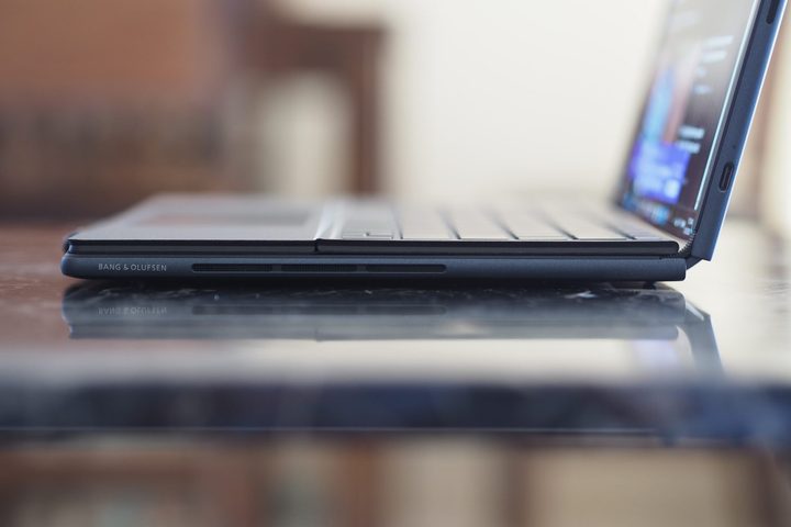 HP Spectre Foldable PC side view showing speakers and lid.