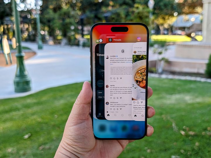 Blue Titanium iPhone 15 Pro showing app switcher.